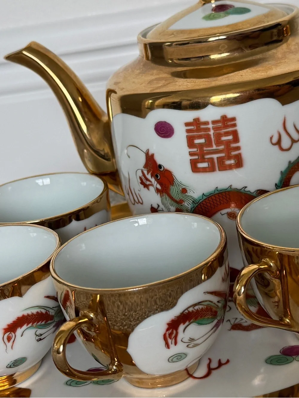 Porcelain tea set with Chinese deagon motifs